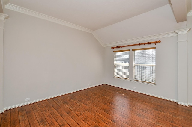 unfurnished room with lofted ceiling, ornamental molding, decorative columns, and hardwood / wood-style flooring