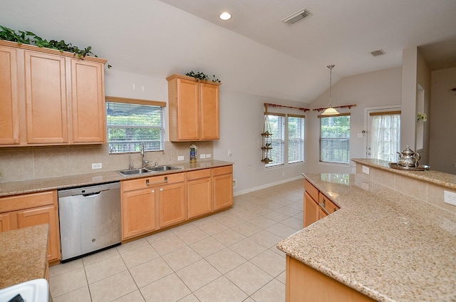 kitchen featuring a sink, visible vents, stainless steel dishwasher, and light brown cabinetry