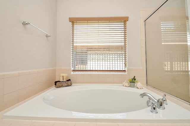 full bathroom featuring a garden tub