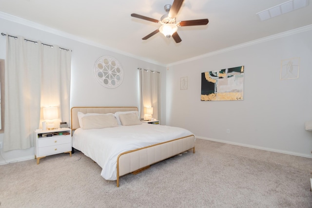 bedroom featuring light carpet, baseboards, visible vents, and crown molding