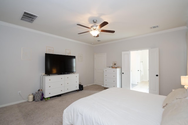 bedroom featuring light colored carpet, visible vents, and crown molding