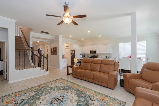 living room featuring light tile patterned floors, recessed lighting, visible vents, stairway, and ornamental molding