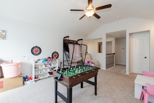 game room with carpet floors and vaulted ceiling