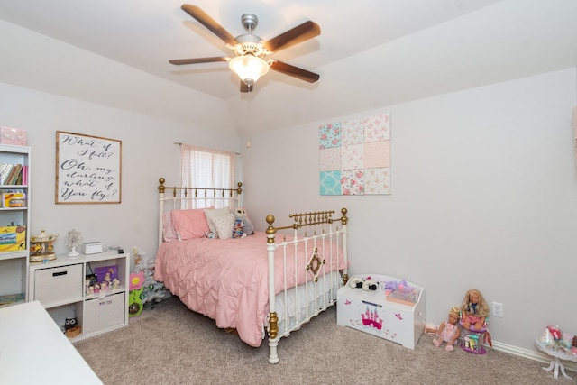 carpeted bedroom featuring a ceiling fan and vaulted ceiling