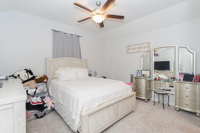 bedroom with light carpet, ceiling fan, and lofted ceiling