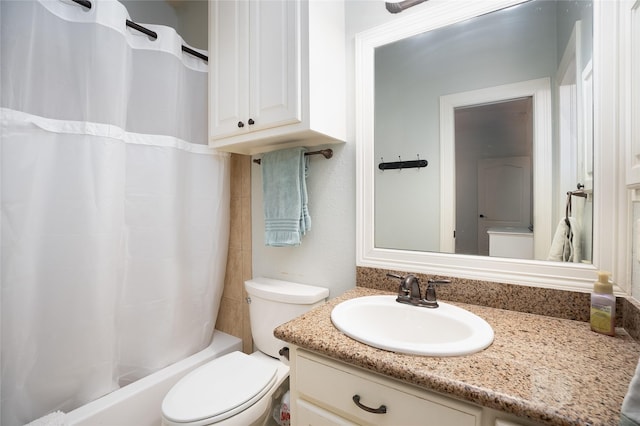 bathroom with toilet, shower / bath combo, and vanity