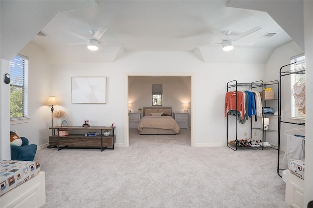 bedroom with baseboards, visible vents, vaulted ceiling, and carpet flooring