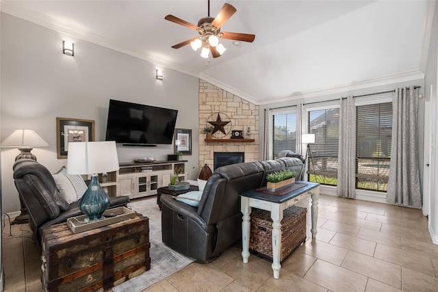 tiled living area featuring a ceiling fan, vaulted ceiling, crown molding, and a stone fireplace