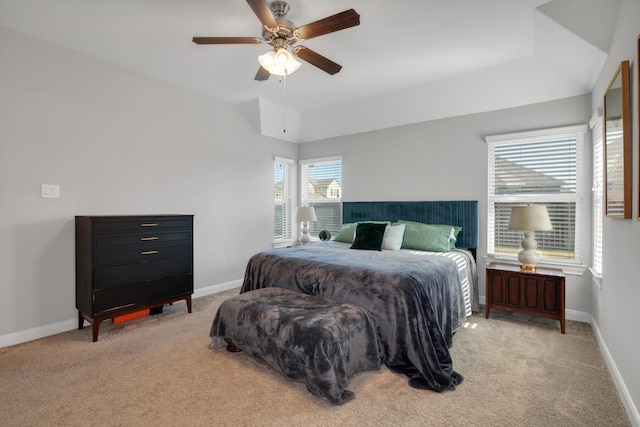 bedroom with a ceiling fan, baseboards, and carpet floors