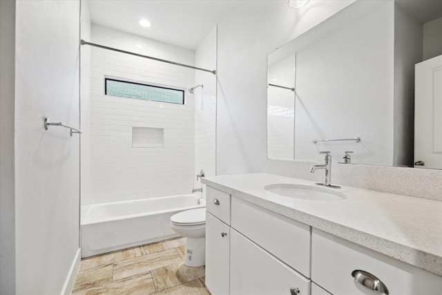 full bathroom with shower / bathing tub combination, vanity, and toilet