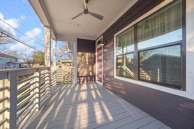 wooden terrace with ceiling fan