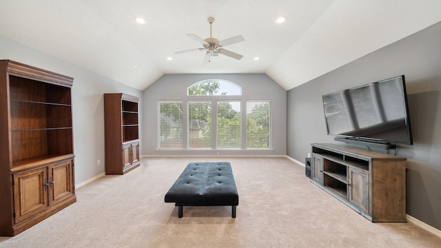 living area featuring vaulted ceiling, recessed lighting, baseboards, and light colored carpet