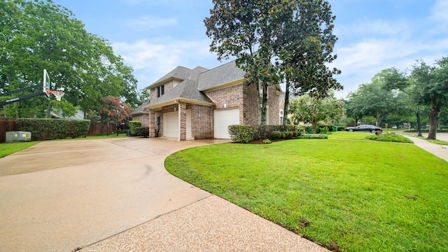 view of property exterior featuring brick siding, a shingled roof, fence, a yard, and concrete driveway