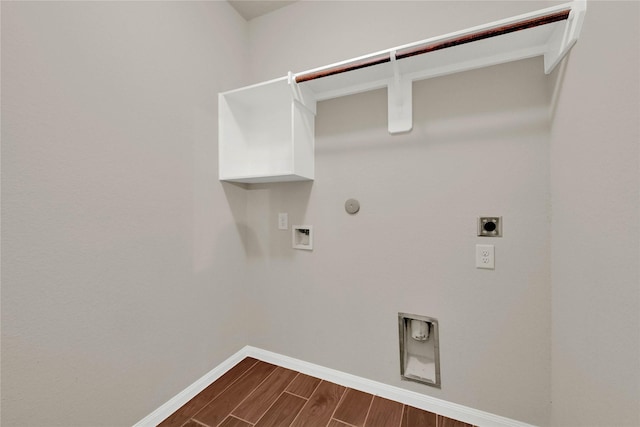 clothes washing area with laundry area, gas dryer hookup, hookup for a washing machine, hookup for an electric dryer, and wood finish floors