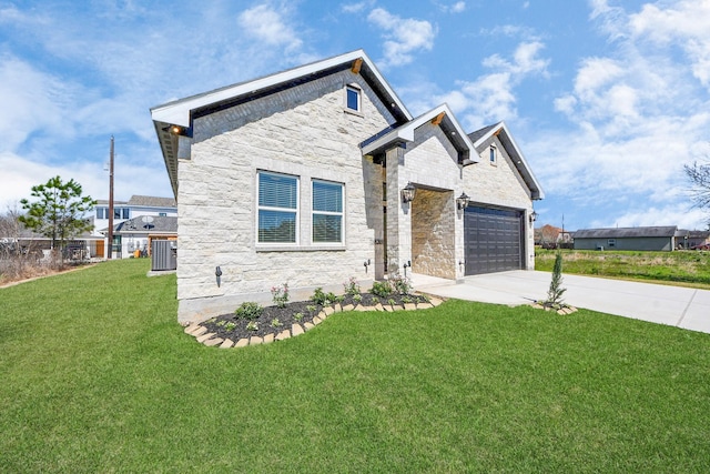 view of front of property with a garage, central AC, concrete driveway, stone siding, and a front lawn