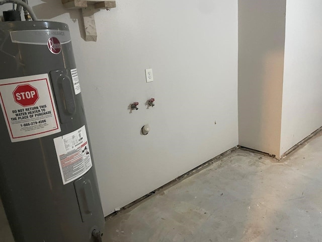 utility room featuring water heater