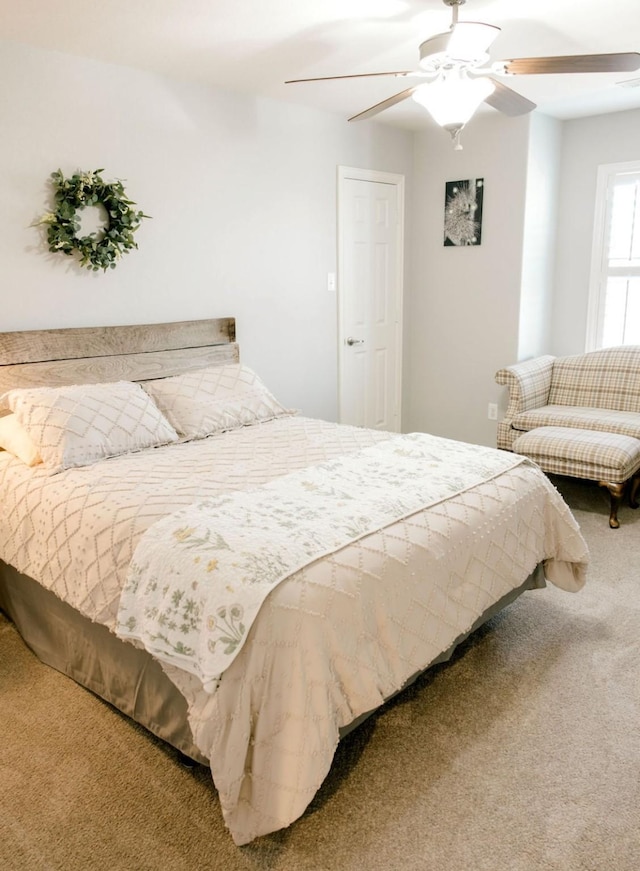 bedroom with carpet and ceiling fan