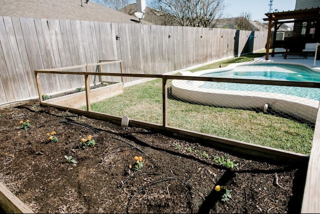 view of yard with a patio area, a fenced backyard, and a fenced in pool