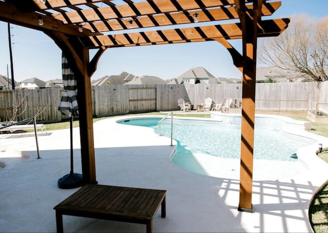 view of swimming pool with a patio area, a fenced backyard, a fenced in pool, and a pergola