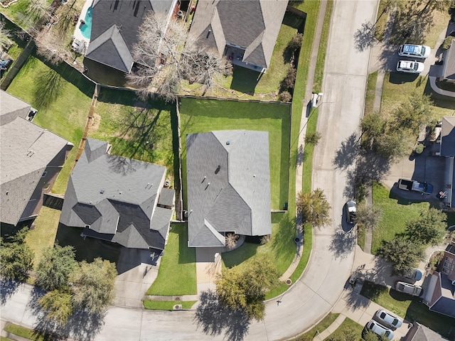 birds eye view of property with a residential view