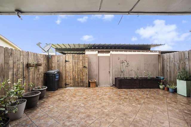 view of patio featuring a fenced backyard