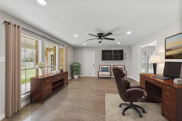 office space with light wood-type flooring, recessed lighting, baseboards, and ceiling fan