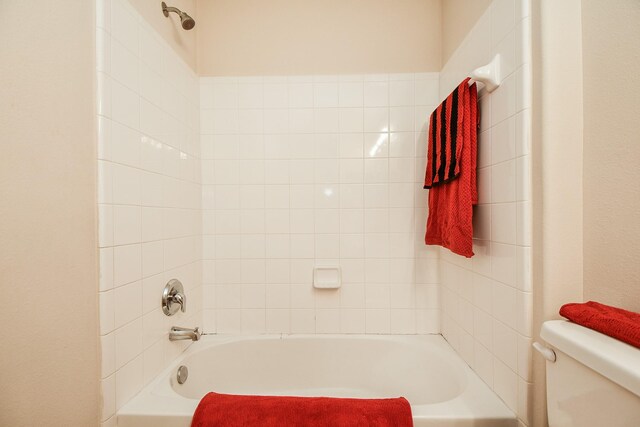 full bath with toilet and  shower combination