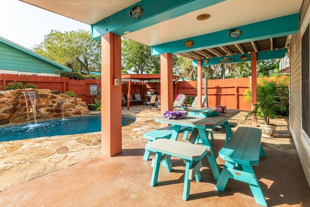 view of patio with a fenced backyard and a fenced in pool