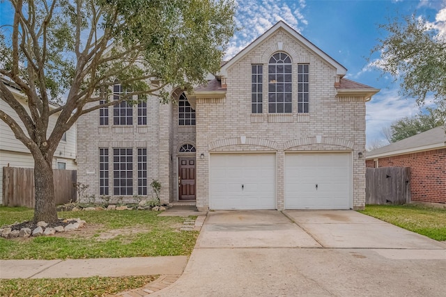 view of front of home with a garage, fence, concrete driveway, and brick siding