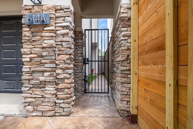 entrance to property featuring a garage