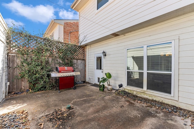 view of patio / terrace with fence and area for grilling