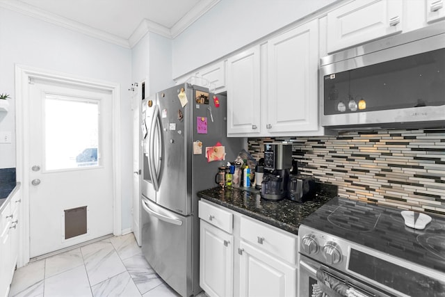 kitchen featuring marble finish floor, crown molding, stainless steel appliances, tasteful backsplash, and white cabinets