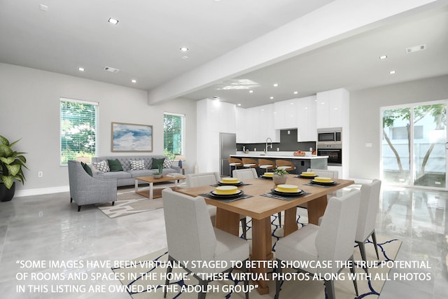 dining space with recessed lighting, visible vents, and baseboards