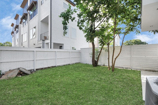 view of yard with a fenced backyard