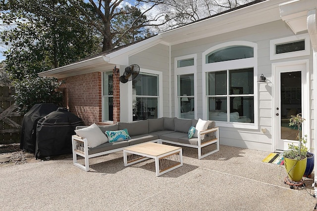 view of patio / terrace featuring an outdoor living space and a grill