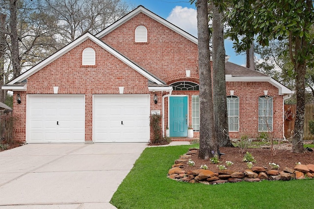 view of front of house featuring a front yard, brick siding, concrete driveway, and an attached garage