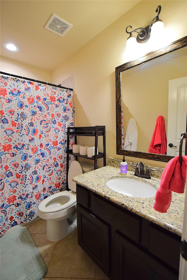 full bath with visible vents, toilet, tile patterned floors, curtained shower, and vanity