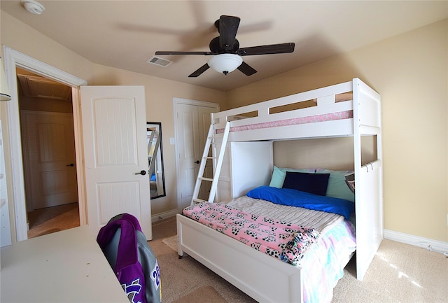 bedroom featuring visible vents, baseboards, a closet, carpet, and attic access