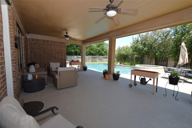 10010 Friesian Estates Dr, Spring, TX 77379 - view of patio / terrace with ceiling fan, a fenced backyard, an in-ground hot tub, and an outdoor hangout area
