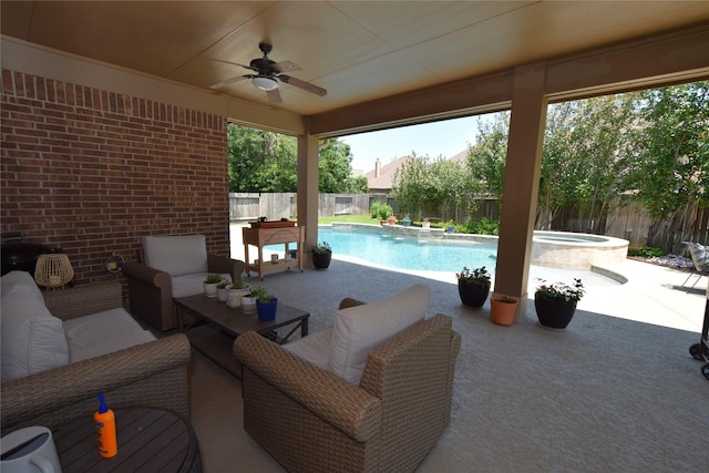 10010 Friesian Estates Dr, Spring, TX 77379 - view of patio with a fenced backyard, a ceiling fan, and an in-ground hot tub