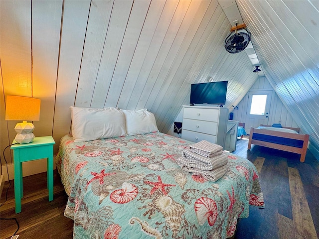 310 Angel Wing St, Surfside Beach, TX 77541 - bedroom featuring lofted ceiling, wood walls, and wood finished floors