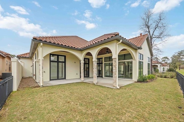 rear view of property featuring a fenced backyard, a patio area, a tile roof, and central air condition unit