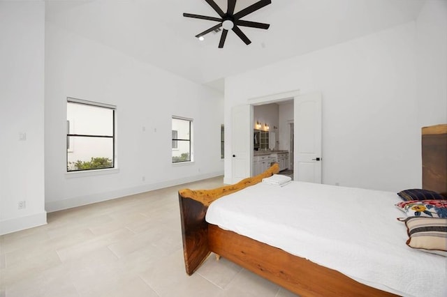 bedroom featuring a ceiling fan and baseboards