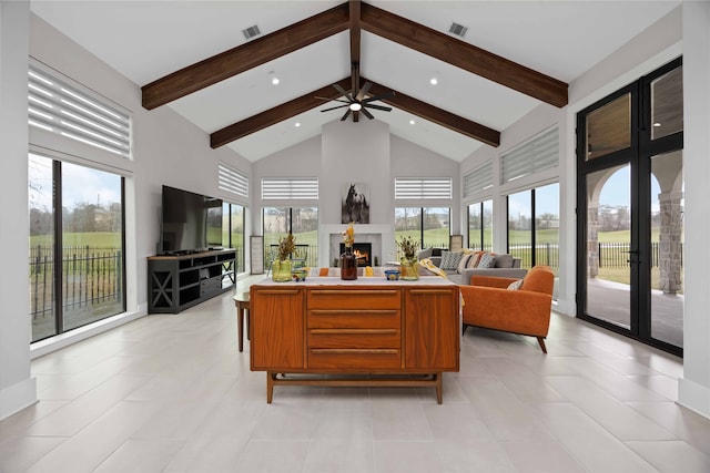 living area featuring high vaulted ceiling, a warm lit fireplace, visible vents, and beam ceiling