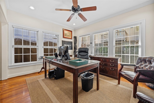 office with baseboards, a ceiling fan, light wood-style flooring, crown molding, and recessed lighting