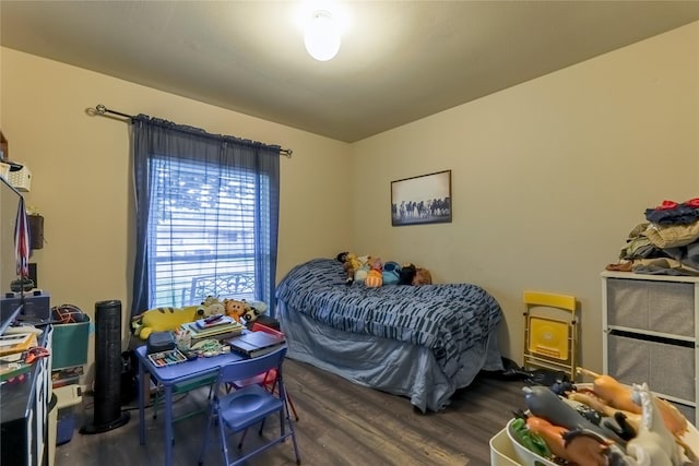 bedroom featuring wood finished floors