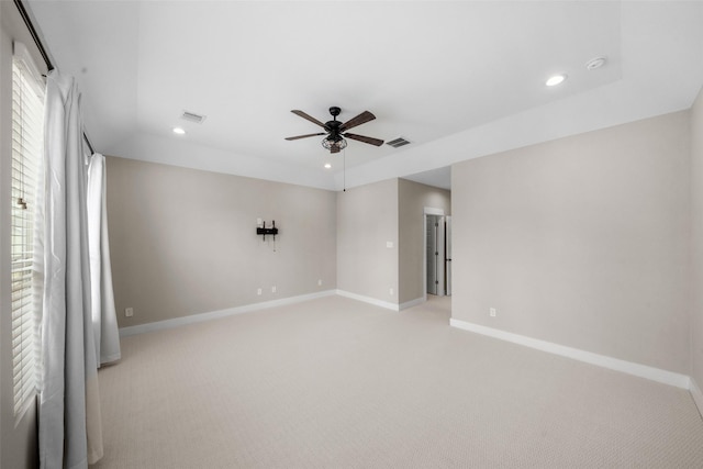 spare room featuring recessed lighting, visible vents, ceiling fan, and light colored carpet