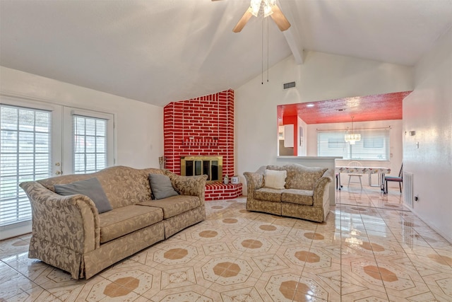 living area featuring ceiling fan, high vaulted ceiling, a fireplace, visible vents, and beamed ceiling