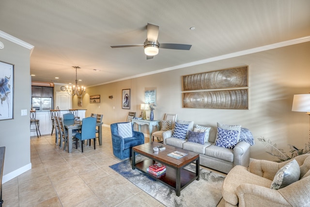 living room with baseboards, ceiling fan with notable chandelier, light tile patterned flooring, and crown molding