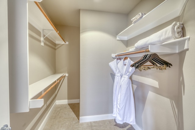 spacious closet with tile patterned flooring